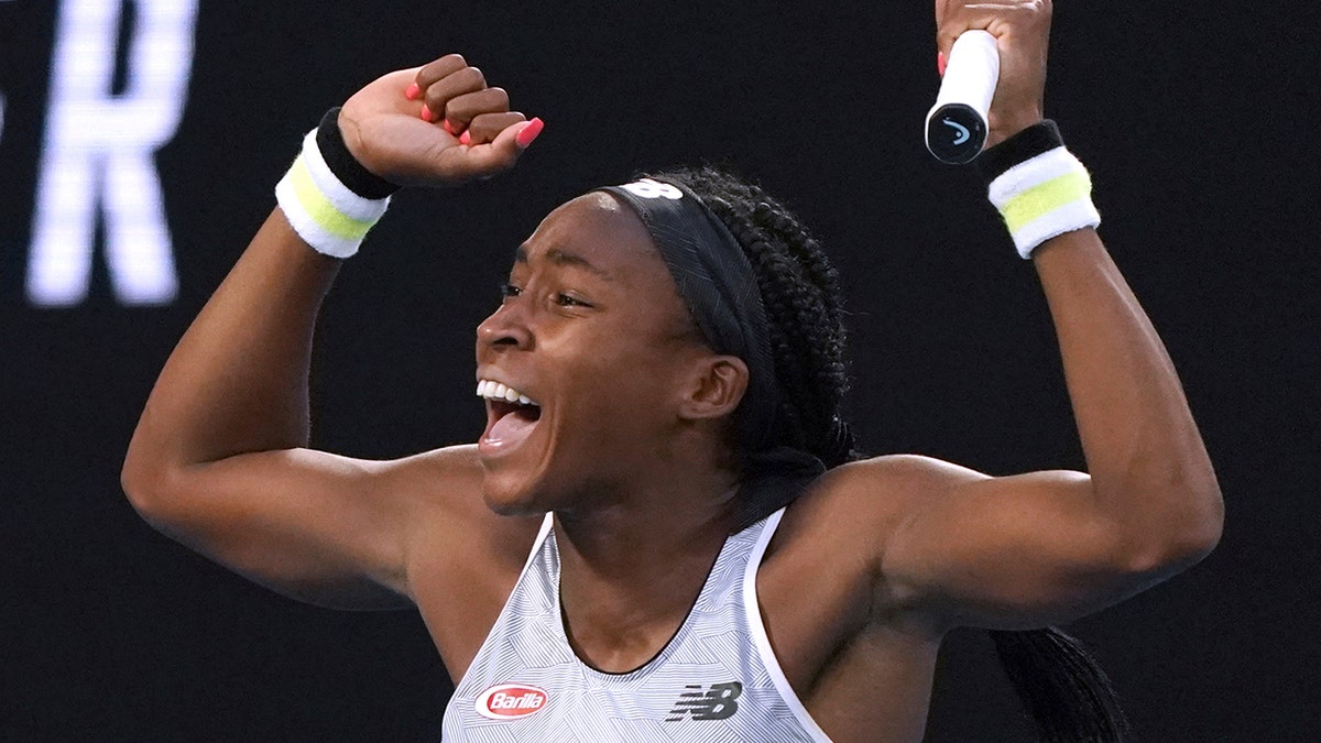 Coco Gauff of the U.S. celebrates after defeating Japan's Naomi Osaka in their third round singles match at the Australian Open tennis championship in Melbourne, Australia, Friday, Jan. 24, 2020. (AP Photo/Lee Jin-man)