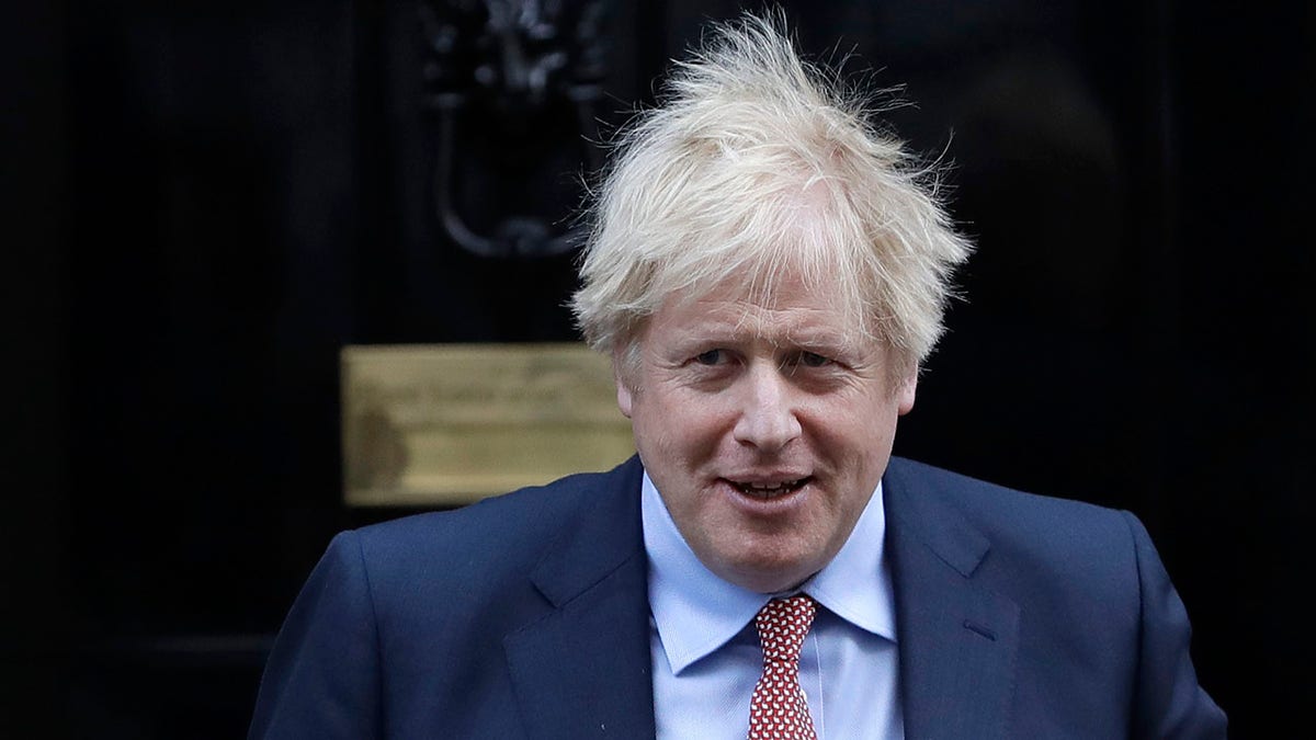 Britain's Prime Minister Boris Johnson leaves 10 Downing Street to attend the weekly session of Prime Ministers Questions in Parliament in London, Wednesday, Jan. 29, 2020.  (AP Photo/Kirsty Wigglesworth)