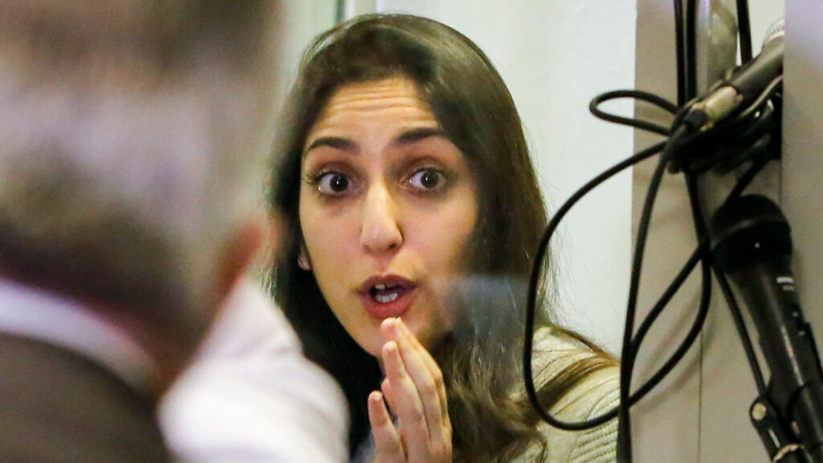 Israeli Naama Issachar gestures during an appeal hearing in a courtroom in Moscow, Russia. 