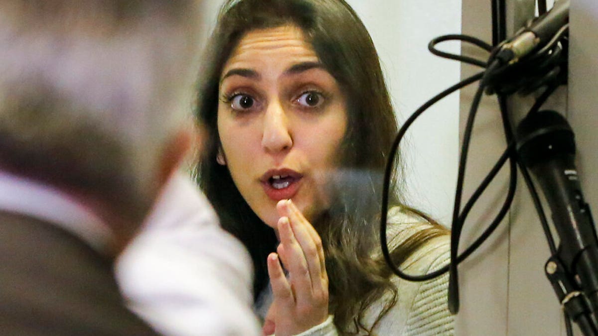 Israeli Naama Issachar gestures during an appeal hearing in a courtroom in Moscow, Russia.