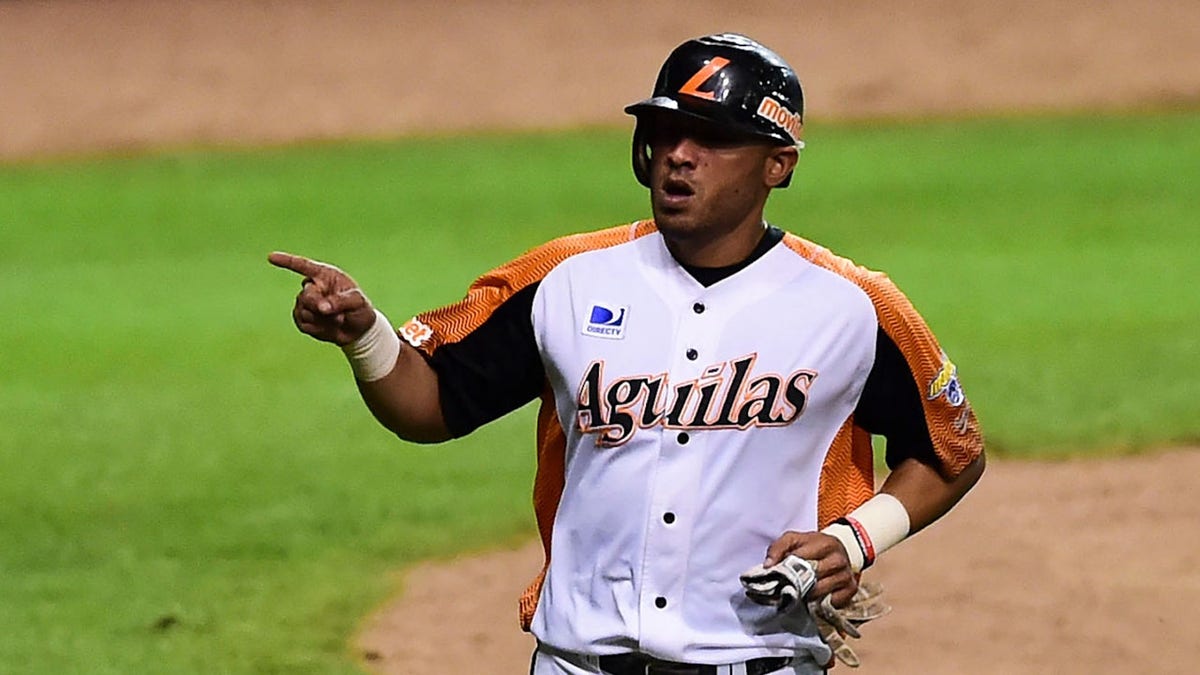 Alex Romero of Aguilas del Zulia from Venezuela celebrates after scoring against Alazanes de Granma from Cuba during their Caribbean Baseball Series at the Tomateros stadium in Culiacan, Sinaloa State, Mexico, on Feb. 4, 2017. (RONALDO SCHEMIDT/AFP via Getty Images)