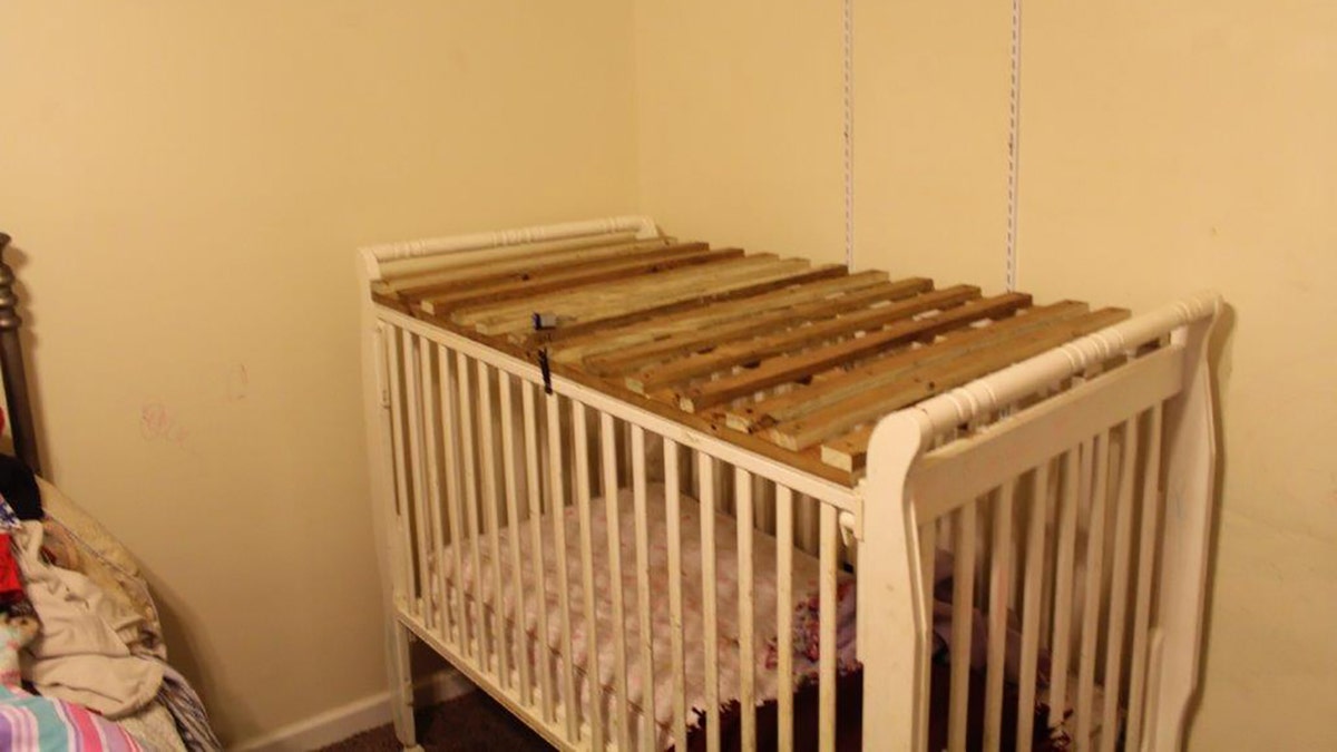 The two cages appeared to each have a mattress and blanket inside.