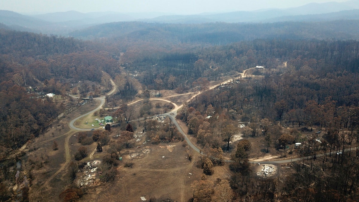 Properties at Nerrigundah, Australia, Monday, Jan. 13, 2020, are damaged and destroyed after a wildfire ripped through the town on New Year's Eve.