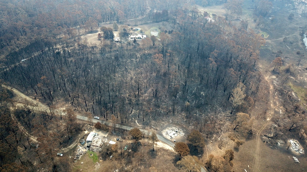 Properties at Nerrigundah, Australia, Monday, Jan. 13, 2020, are damaged and destroyed after a wildfire ripped through the town on New Year's Eve.