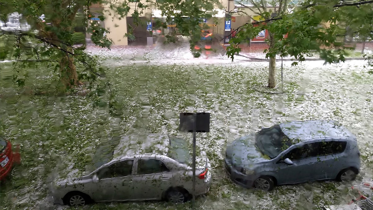 Dust storms, hail and flash floods have battered beleaguered Australian cities in recent days.