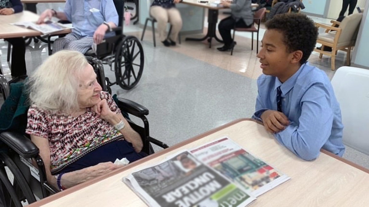 Hildegard, 94, talks with New York City middle schooler Basti Williams. The two became friends through their shared German heritage.