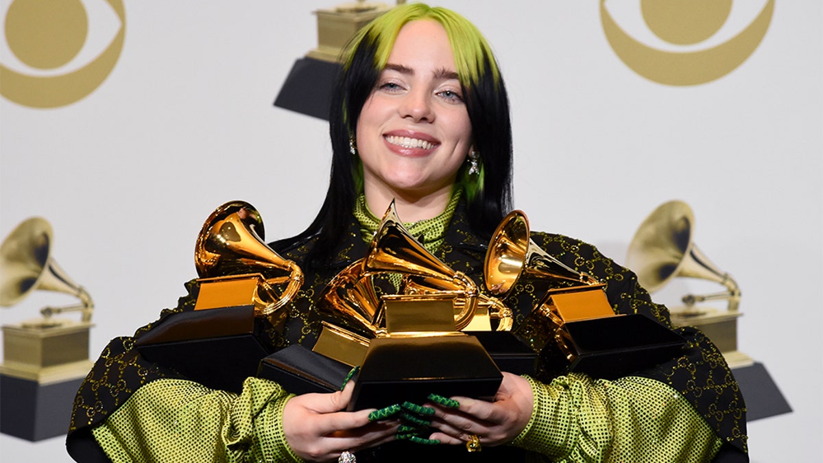 Billie Eilish with the awards for best album and best pop vocal album for "We All Fall Asleep, Where Do We Go?", best song and record for "Bad Guy" and best new artist at the 62nd annual Grammy Awards.