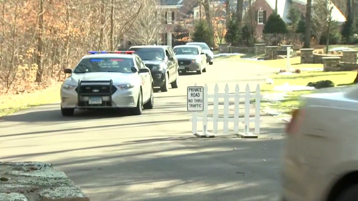 Law enforcement seen at the home of Fotis Dulos, the estranged husband of long-missing Connecticut mother of five Jennifer Dulos.