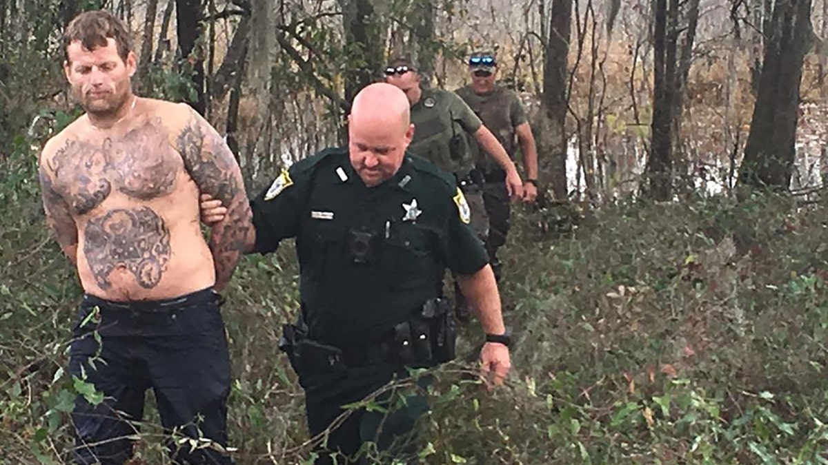 Booth was arrested and transported, still soaking wet, to the county jail, the sheriff's office said.