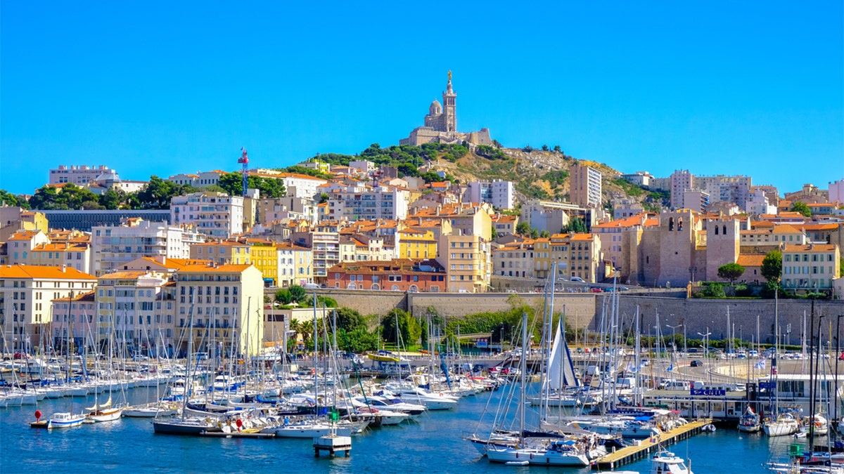 Marseille embankment with yachts and boats in the Old Port and Notre Dame de la Garde., Vieux-Port de Marseille.