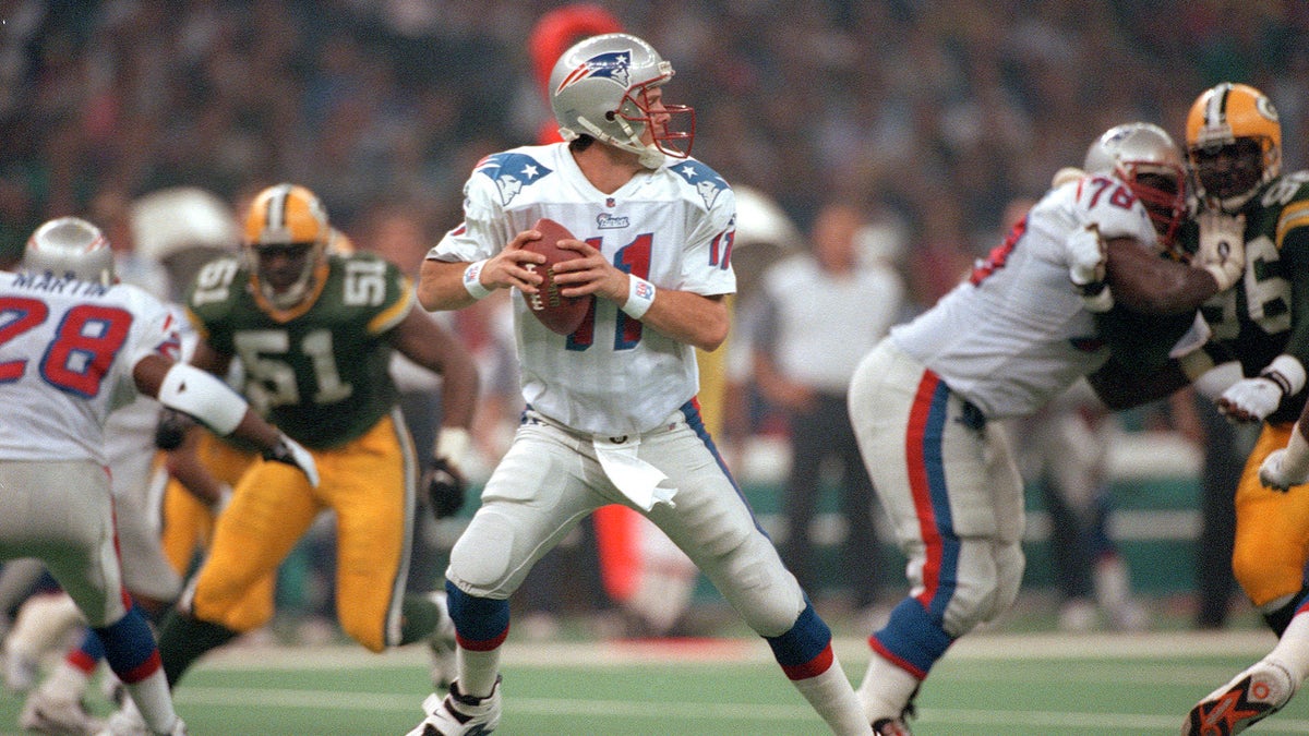 Drew Bledsoe threw four interceptions against the Packers. (Photo by Focus on Sport/Getty Images)