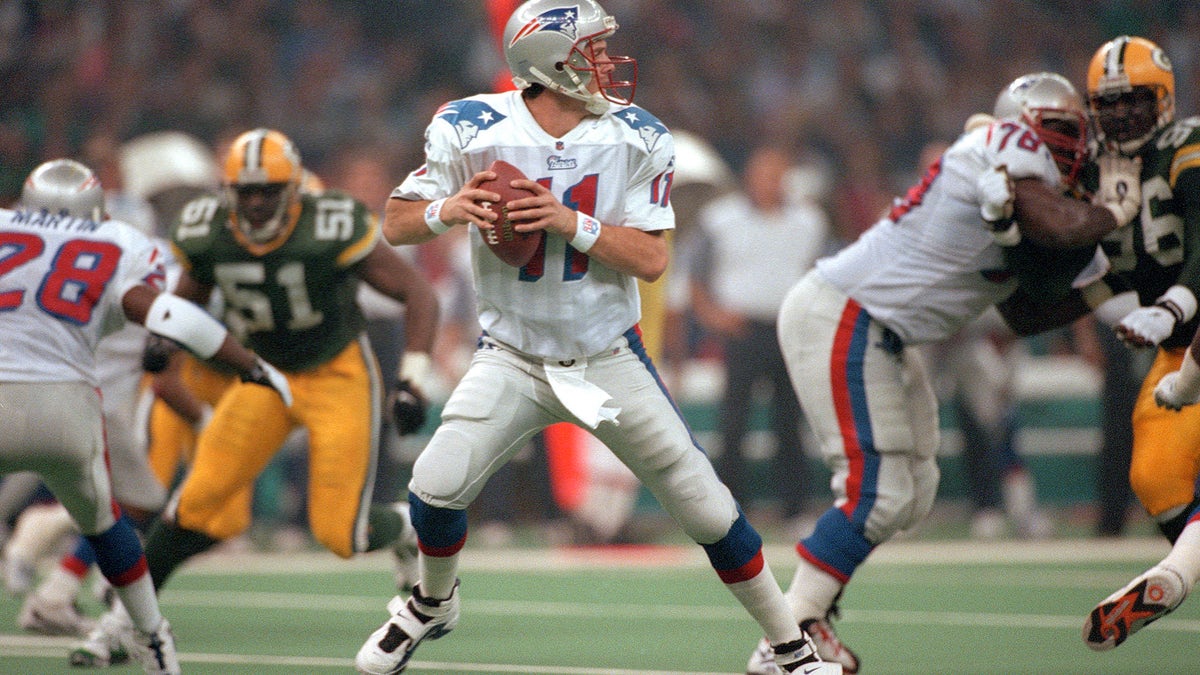 Drew Bledsoe threw four interceptions against the Packers. (Photo by Focus on Sport/Getty Images)