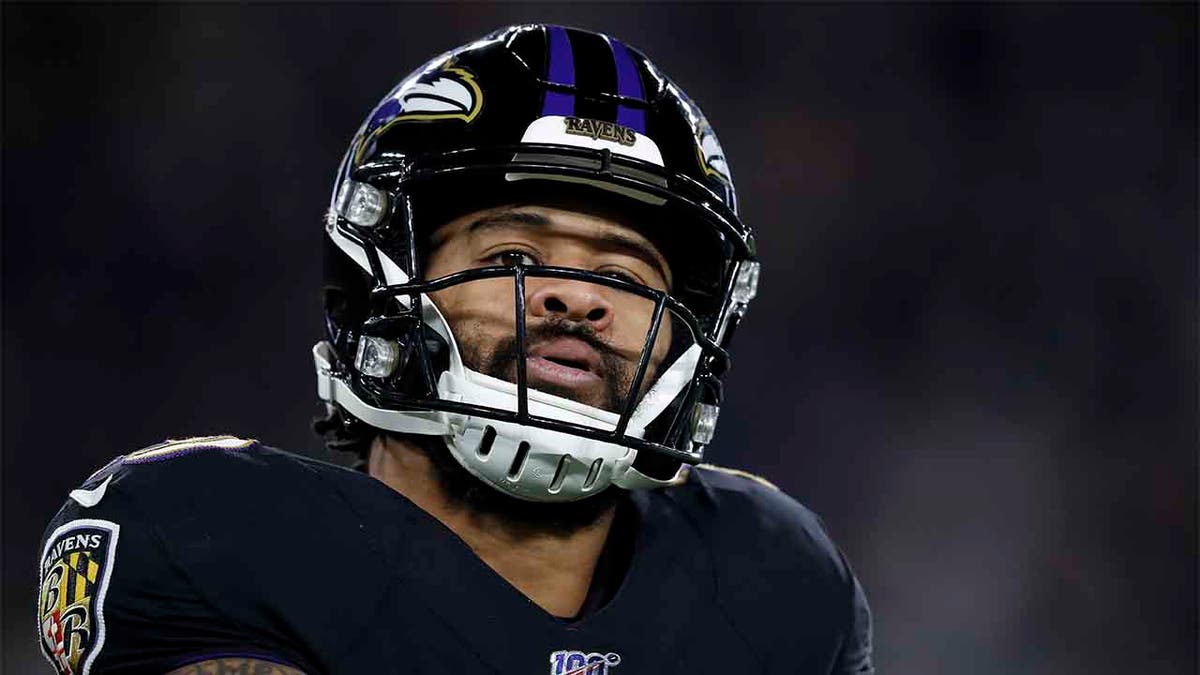 Earl Thomas (No. 29) of the Baltimore Ravens reacts after a play against the New England Patriots during a game in Baltimore, Nov. 3, 2019. He was held at gunpoint by his wife last month after she allegedly caught him cheating on her, police say. (Getty Images)