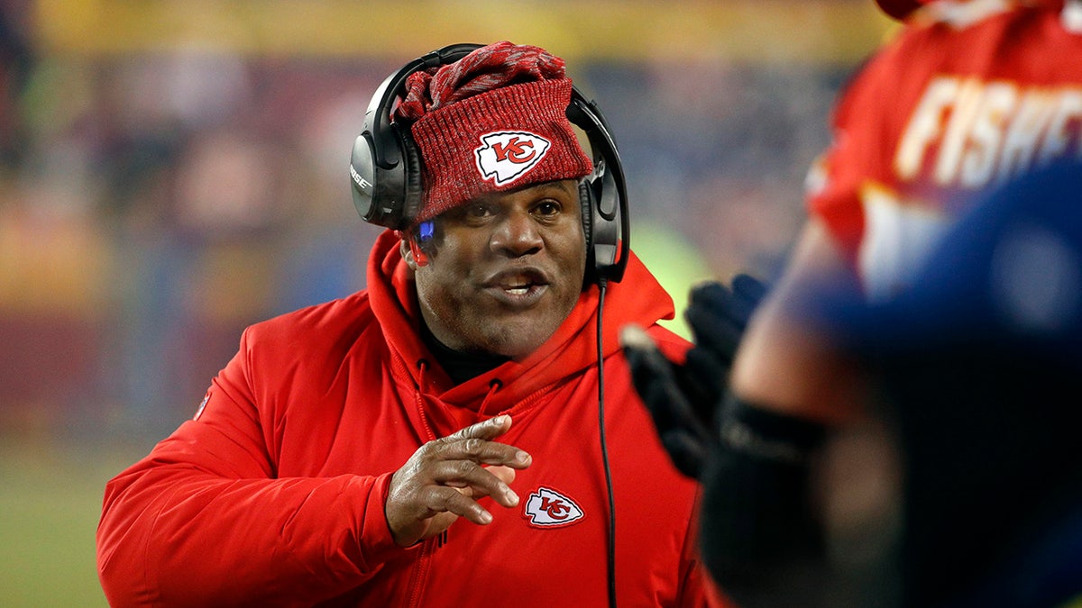 FILE - In this Jan. 20, 2019, file photo, Kansas City Chiefs offensive coordinator Eric Bieniemy gestures during the second half of the AFC Championship NFL football game, in Kansas City, Mo.
