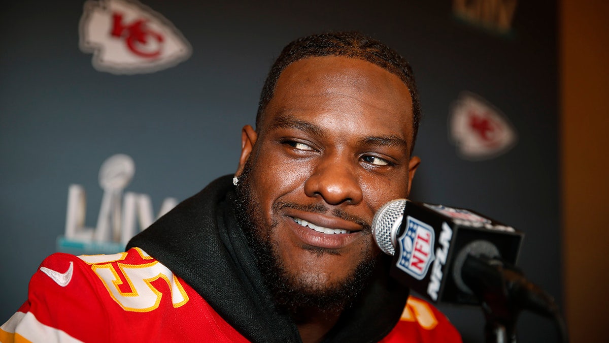 Kansas City Chiefs defensive end Frank Clark (55) during a news conference on Tuesday, Jan. 28, 2020, in Aventura, Fla., for the NFL Super Bowl 54 football game. (AP Photo/Brynn Anderson)