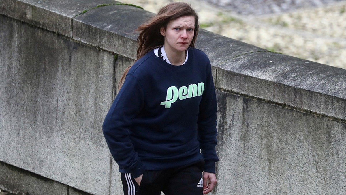 Gemma Watts, a British woman who pleaded guilty to posing as a teenage boy to sexually groom young girls, walks to the Winchester Crown Court in Winchester, Britain, January 10, 2020. REUTERS/Simon Dawson - RC2YCE9WVONL