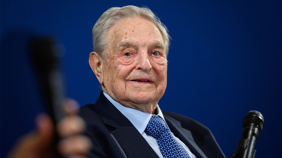 On the sidelines of the World Economic Forum in Davos, Switzerland, George Soros says he’s injecting $1 billion into a new university network that the 89-year-old billionaire investor calls the “most important and most enduring project of my life.” (FABRICE COFFRINI/AFP via Getty Images)