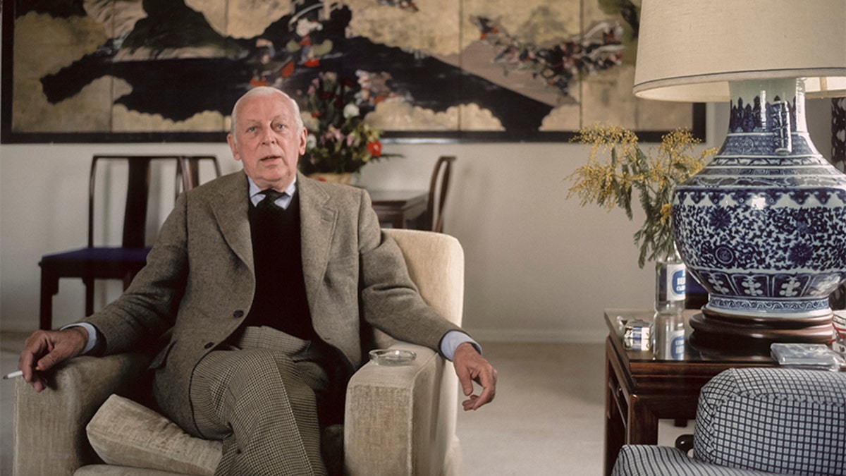 Alistair Cooke poses for a portrait in February 1983 in a hotel in San Francisco, California. Cooke was the longtime host of the PBS show "Masterpiece Theatre."