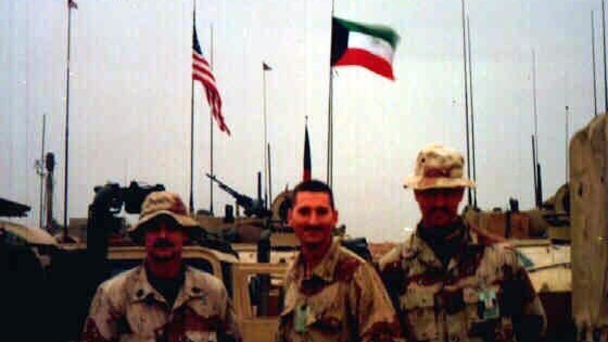 Hannel (center) with fellow Marines during Desert Storm as they moved north. (Courtesy of Eric Hannel)