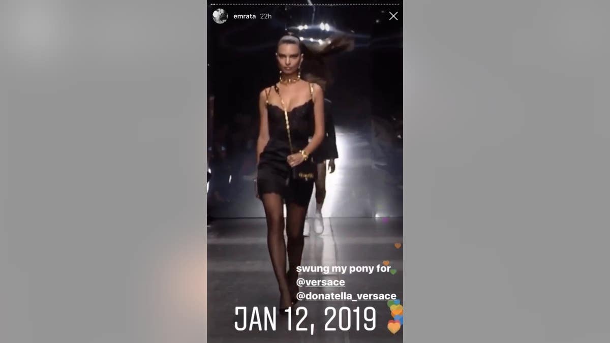 Emily Ratajkowski walks the runway for Versace.