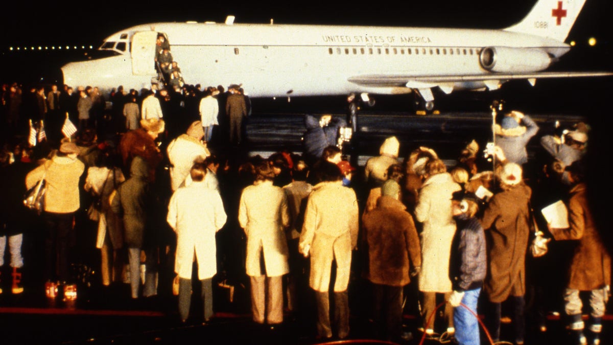 The first of the 52 American hostages freed from Iran, leave a U.S. Airforce hospital plane after its arrival at Rhein-Main Air Base, near Frankfurt, Germany, January 21, 1981.  (AP Photo/Str)