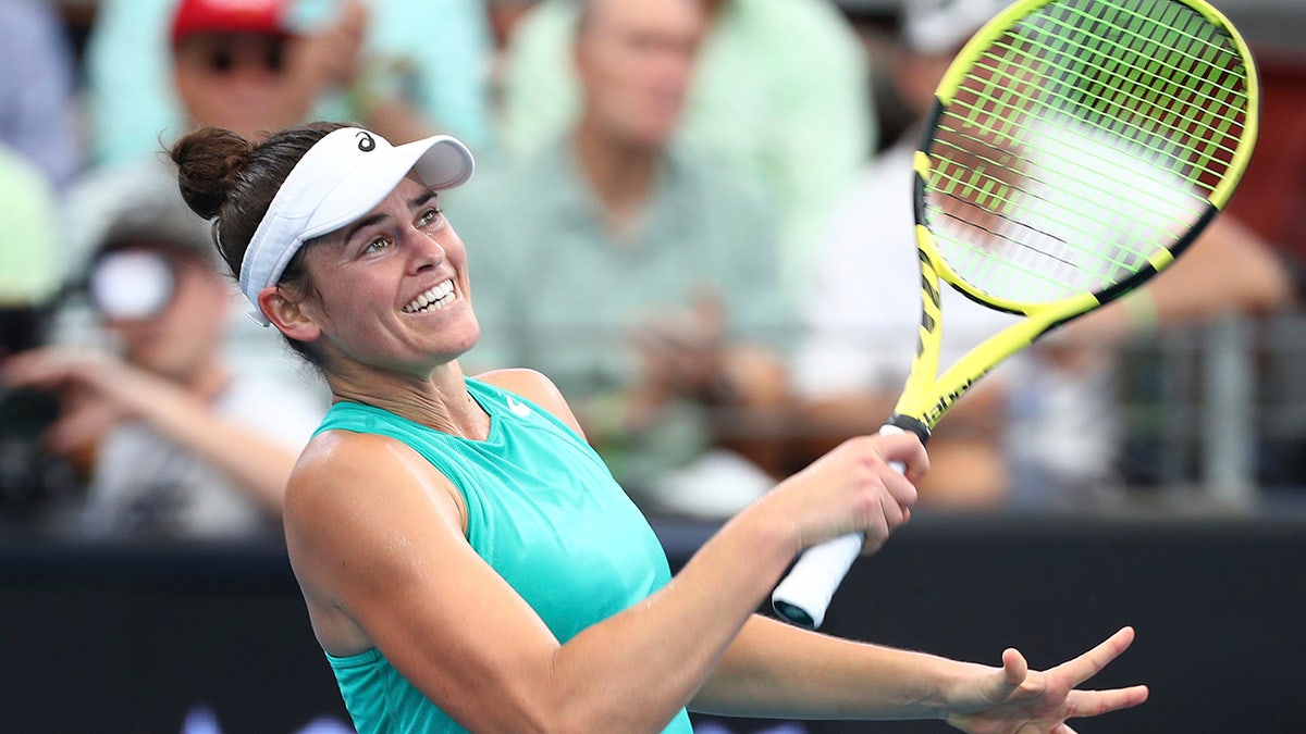 Jennifer Brady of the United States reacts after winning her match against Ashleigh Barty of Australia 6-4, 7-6, at the Brisbane International tennis tournament in Brisbane, Australia, Thursday, Jan. 9, 2020. (AP Photo/Tertius Pickard)