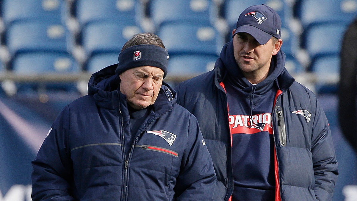 New England Patriots head coach Bill Belichick, left, speaks with special teams coach Joe Judge, right, during NFL football practice in Foxborough, Mass., in this Dec. 20, 2018, file photo. (AP Photo/Steven Senne)