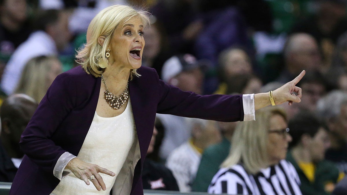 Baylor head coach Kim Mulkey calls in an offensive play in the second half of an NCAA college basketball game against West Virginia, Saturday, Jan. 18, 2020, in Waco, Texas. (AP Photo/Rod Aydelotte)