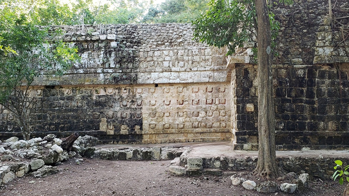 A general view shows the cleaning the stucco of the Temple of the U, located in the archaelogy area of Kuluba, in Tizimin, Yucatan state, Mexico in this handout photograph released to Reuters by the National Institute of Anthropology and History (INAH) on December 24, 2019. (Credit: National Institute of Anthropology and History, Reuters