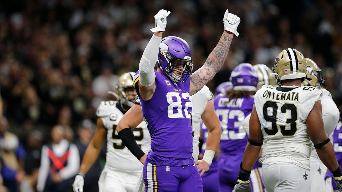 Minnesota Vikings tight end Kyle Rudolph (82) celebrating a touchdown by Dalvin Cook in the second half of the NFL wild-card playoff game against the New Orleans Saints on Sunday. (AP Photo/Brett Duke)
