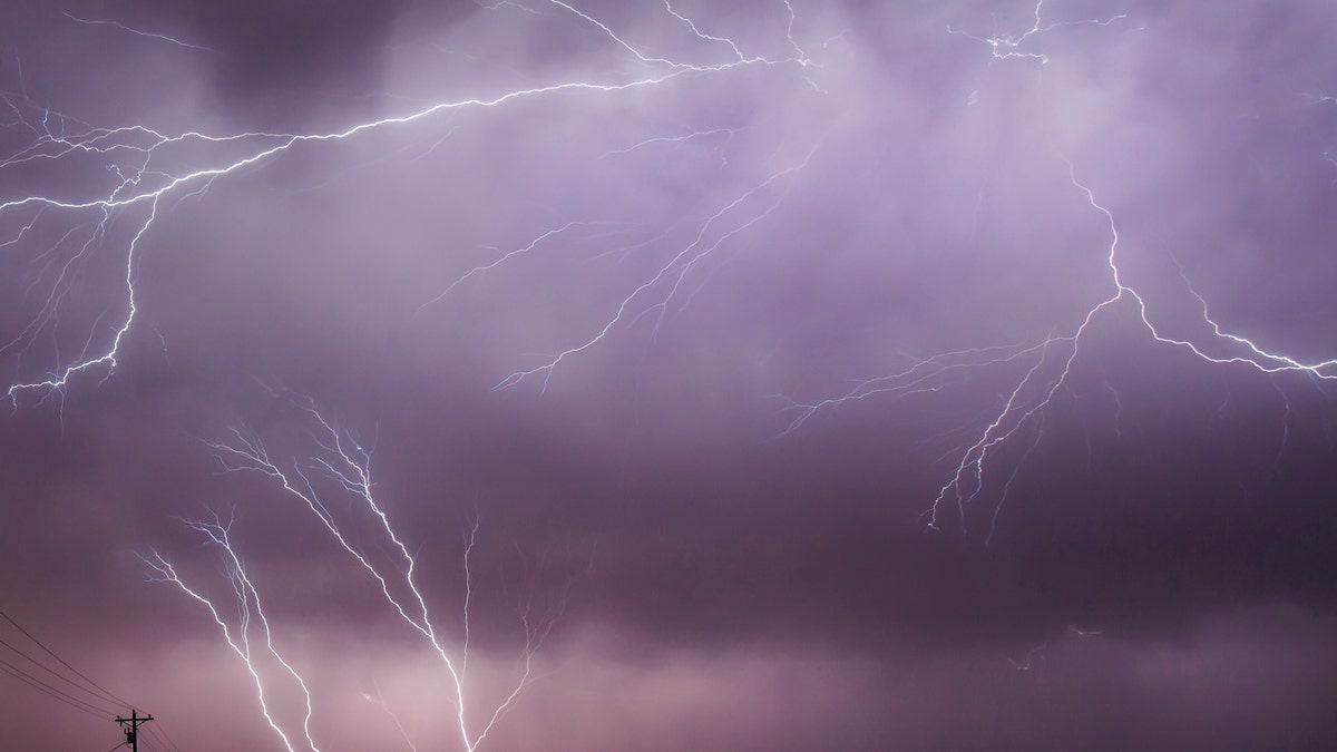 Upward lightning leaps from a communication tower in Bruceville-Eddy, Texas, 27 April 2016 - file photo.