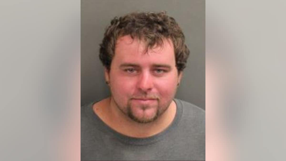 Mason Toney, 28, is charged with murdering his boss Monday. Authorities suspect the slaying may have been prompted by an argument over their opposing political views.  