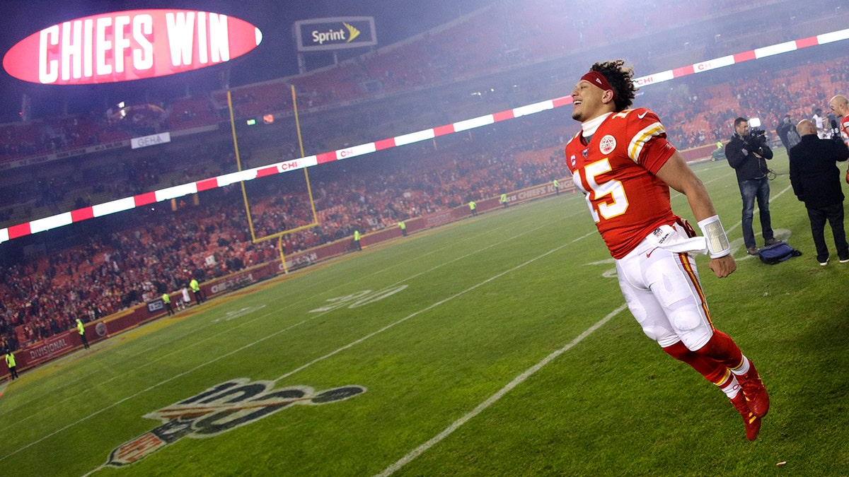 Kansas City Chiefs quarterback Patrick Mahomes celebrates as he comes off the field after an NFL divisional playoff football game against the Houston Texans, Sunday in Kansas City, Mo. (AP Photo/Charlie Riedel)
