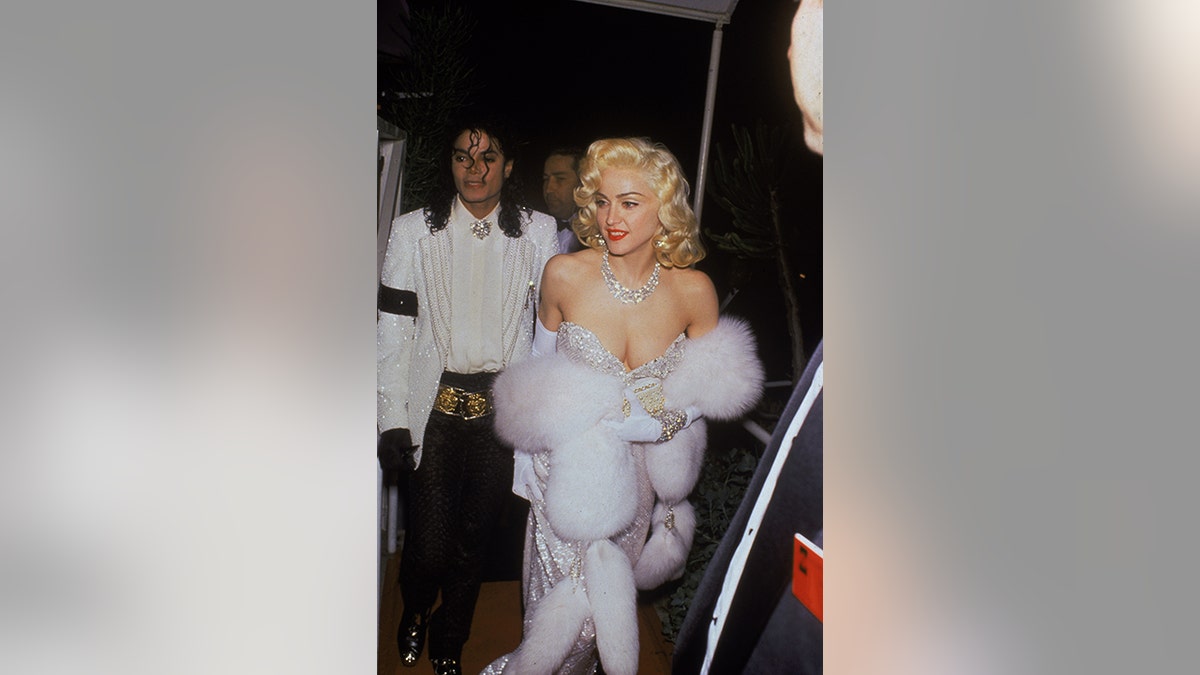 Michael Jackson (left) and Madonna arrive at the Shrine Civic Auditorium for the 63rd Annual Academy Awards ceremony.