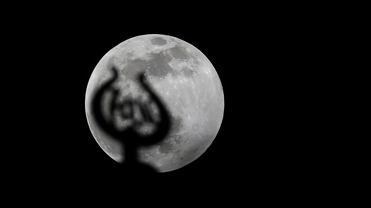 The Moon is seen during partial lunar eclipse over Istanbul, Turkey on January 10, 2020.