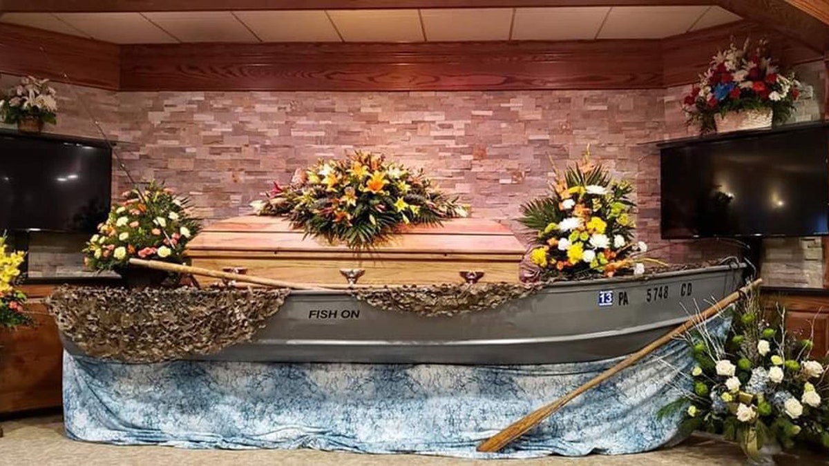 Frey’s casket was placed inside Frey’s own 16-foot aluminum fishing boat, which had been passed down from his grandfather and father, for the viewing.