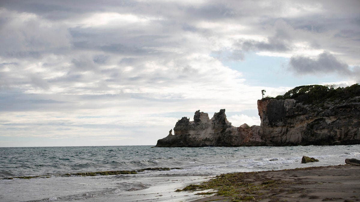 A natural formation known as "Punta Ventana," or Window Point, stands without the bridge that once created the formation of the window, or a hole, in Guayanilla, Puerto Rico.