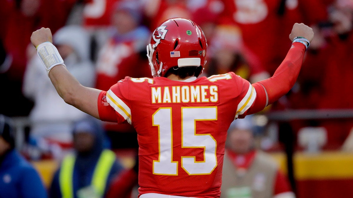 Kansas City Chiefs' Patrick Mahomes reacting after a touchdown run by Damien Williams during the second half of the AFC Championship game. (AP Photo/Charlie Riedel)