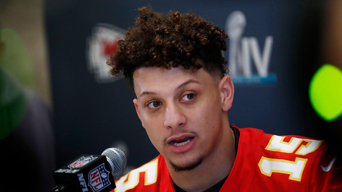 Kansas City Chiefs quarterback Patrick Mahomes (15) speaks during a news conference on Tuesday, Jan. 28, 2020, in Aventura, Fla., for NFL Super Bowl 54 football game. (AP Photo/Brynn Anderson)