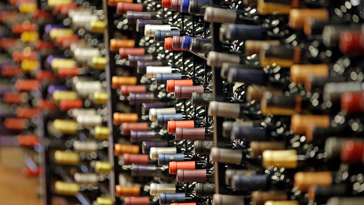 FILE - In this June 16, 2016, file photo, bottles of wine are displayed during a tour of a state liquor store, in Salt Lake City. (AP Photo/Rick Bowmer, File)