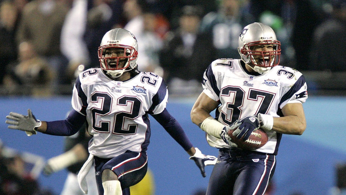 Rodney Harrison, left, had a legendary performance in Supre Bowl XXXIX. (Photo by Brian Bahr/Getty Images)