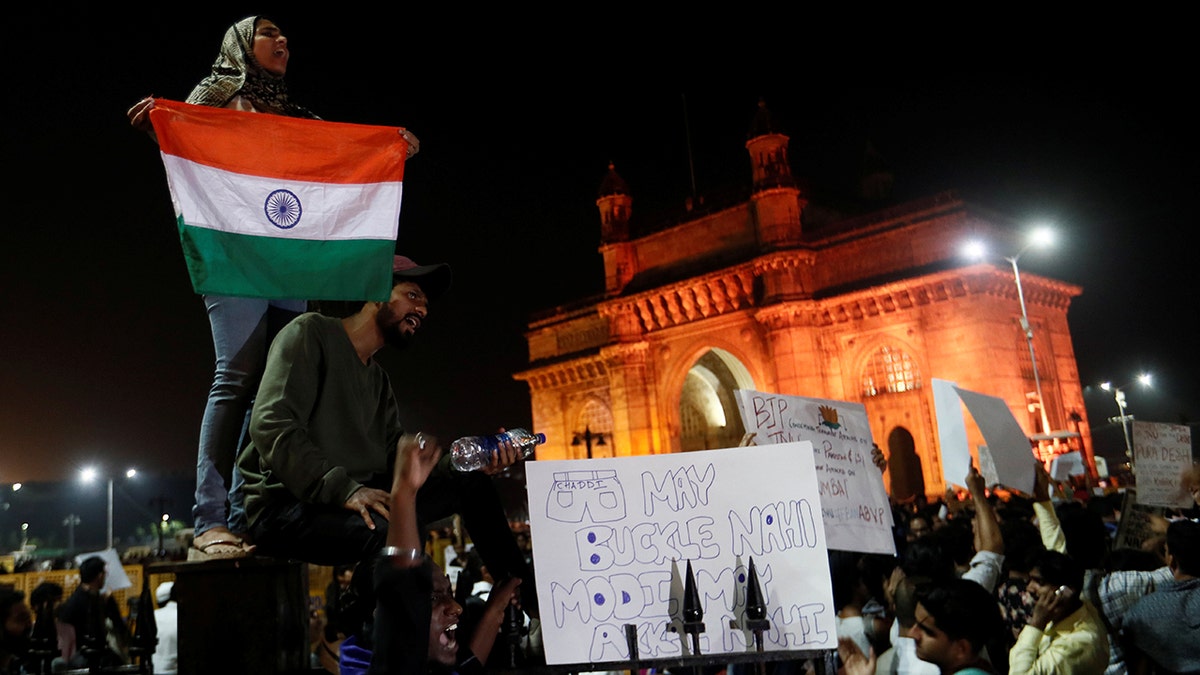 Demonstrators attend a protest against attacks on the students of New Delhi's Jawaharlal Nehru University (JNU), outside the Gateway of India monument in Mumbai, India, January 6, 2020. REUTERS/Francis Mascarenhas - RC2GAE9R168W