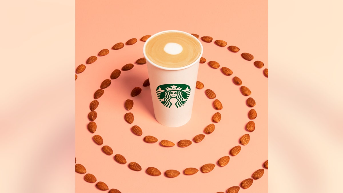 Starbucks' new Almondmilk Honey Flat White drink is described as a "coffee-forward beverage with real honey to complement the almond flavor with a touch of sweetness.”