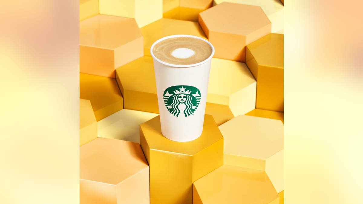 Per the press release, the Oatmilk Honey Latte will be made with Starbucks Blonde Espresso, a Honey Blend infusion and steamed oat milk, topped off with a sweet honey topping.