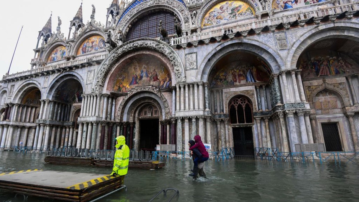 Footbridges were set up for pedestrians in Venice following the record flooding in November.