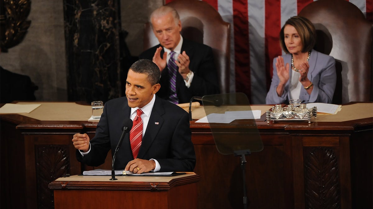 Vice President Joe Biden and House Speaker Nancy Pelosi sit behind President Barack Obama during his State of the Union address to a Joint Session of Congress on Capitol Hill on Jan. 27, 2010, in Washington, D.C. (Toni L. Sandys/The Washington Post via Getty Images)