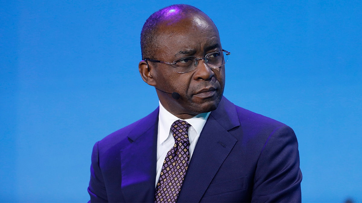 Strive Masiyiwa, founder and chairman of Econet Wireless Global Ltd., attends a panel discussion at the Bloomberg New Economy Forum in Singapore, in 2018. Striking doctors in Zimbabwe accepted his offer to pay them if they go back to work. (Justin Chin/Bloomberg via Getty Images)