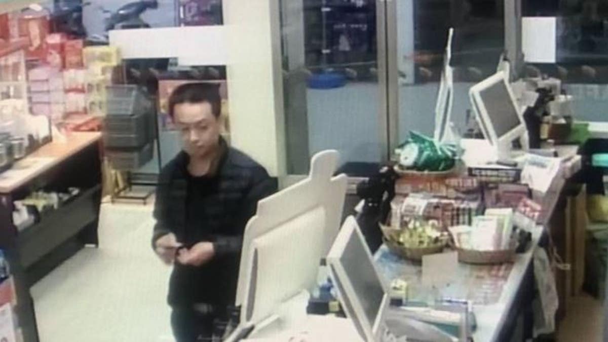 Surveillance from a convenience store showing a suspect in the disappearance and murder of a Chinese-Malaysian woman.