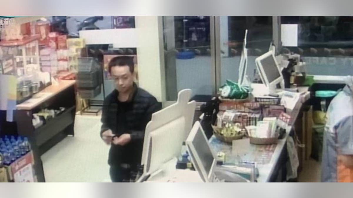 Surveillance from a convenience store showing a suspect in the disappearance and murder of a Chinese-Malaysian woman.