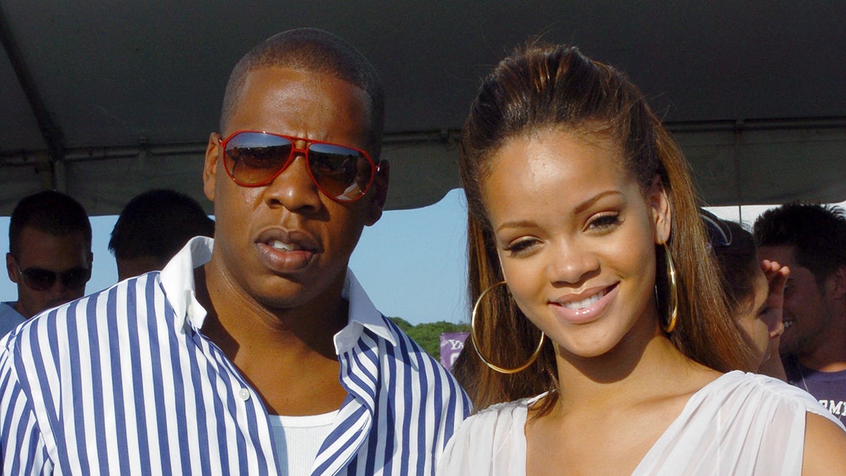 Jay-Z (left) gets together with Rihanna on the second weekend of the 2005 Mercedes-Benz Polo Challenge at the Bridgehampton Polo Club in Bridgehampton, L.I.
